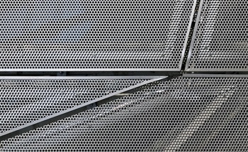Elastic Properties of Perforated Metals
