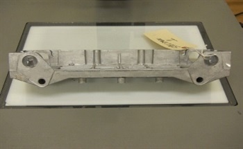 Failure Analysis of Contaminant Related Nonbonding of a Powder Coat to a Surface