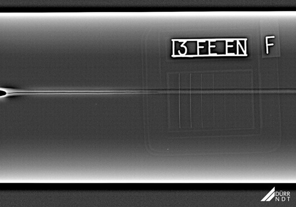 Thin-walled stainless steel cylinder with longitudinal weld seam.