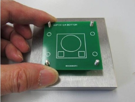 Placing sensor carrier on base