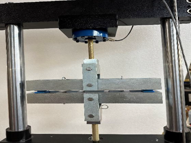 Plastic Pipe Tension test being performed on an ATS UTM
