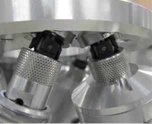 Spherical joint to enhance stiffness in a compact, low-profile design