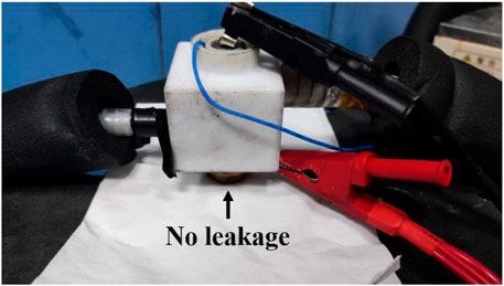 Schematic diagram of water immersion cooling system and leakage test.