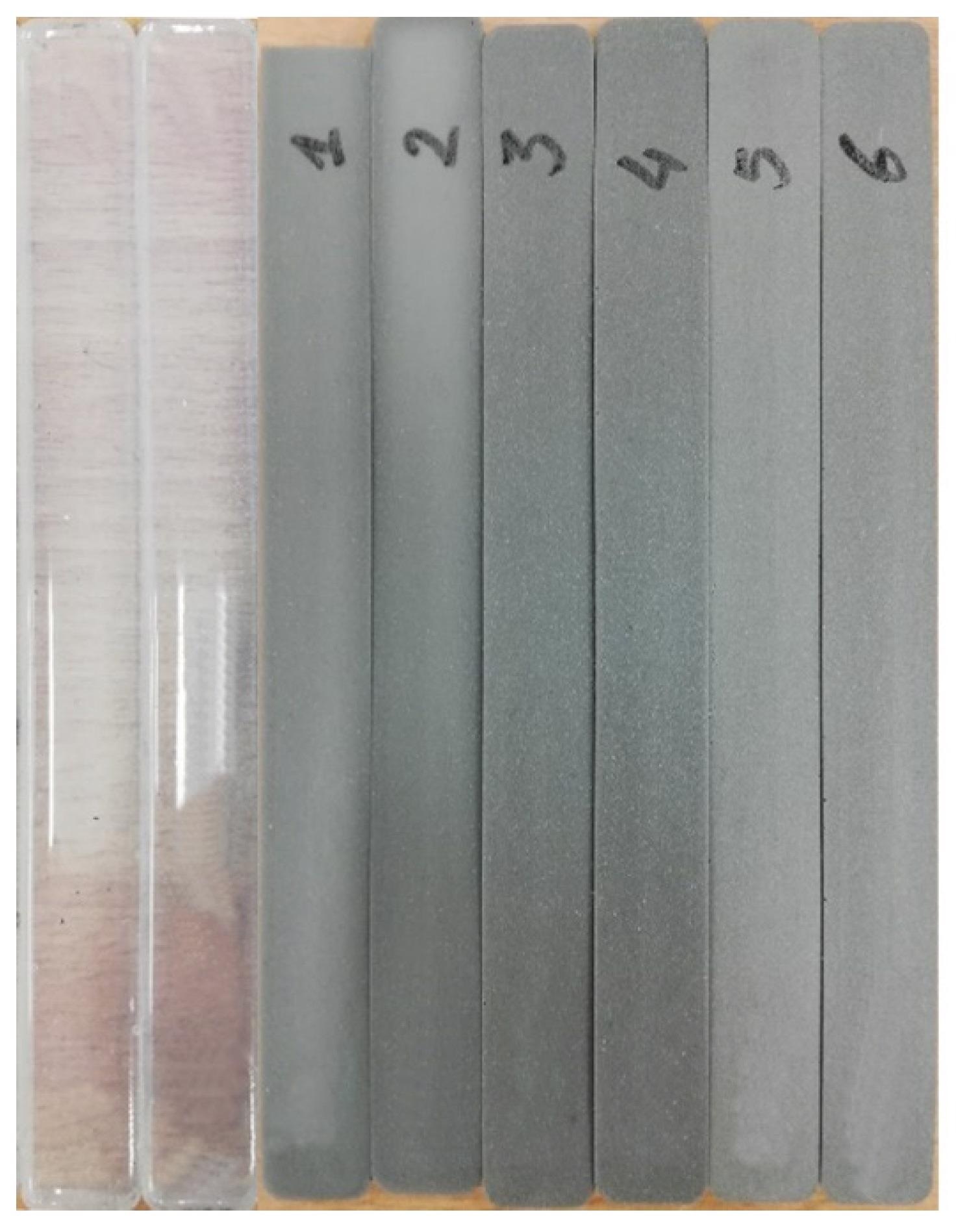 Experimental samples prepared for tensile tests, following ISO 6721 standard requirements. From the left: pure silicone samples; 1 and 2—0.8 mmol/g multilayer silicone composites samples; 3 and 4—1.6 mmol/g multilayer silicone composites samples; 5 and 6—3.2 mmol/g multilayer silicone composites samples.