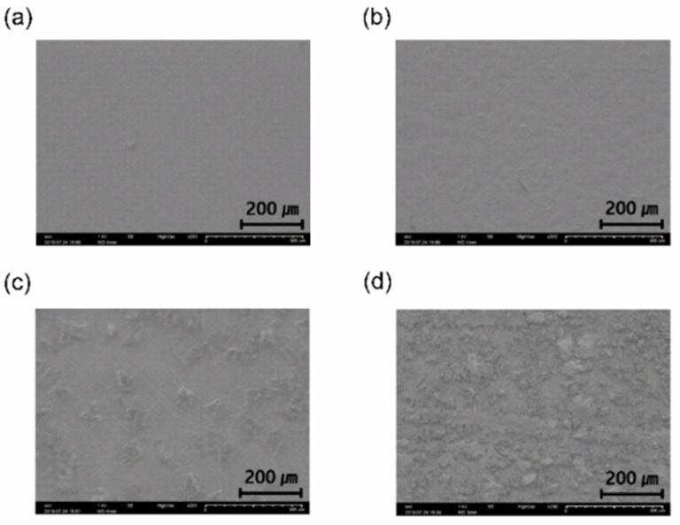 SEM images of the (a) P700 (b) P500 (c) P450 (d) P400 parylene films.