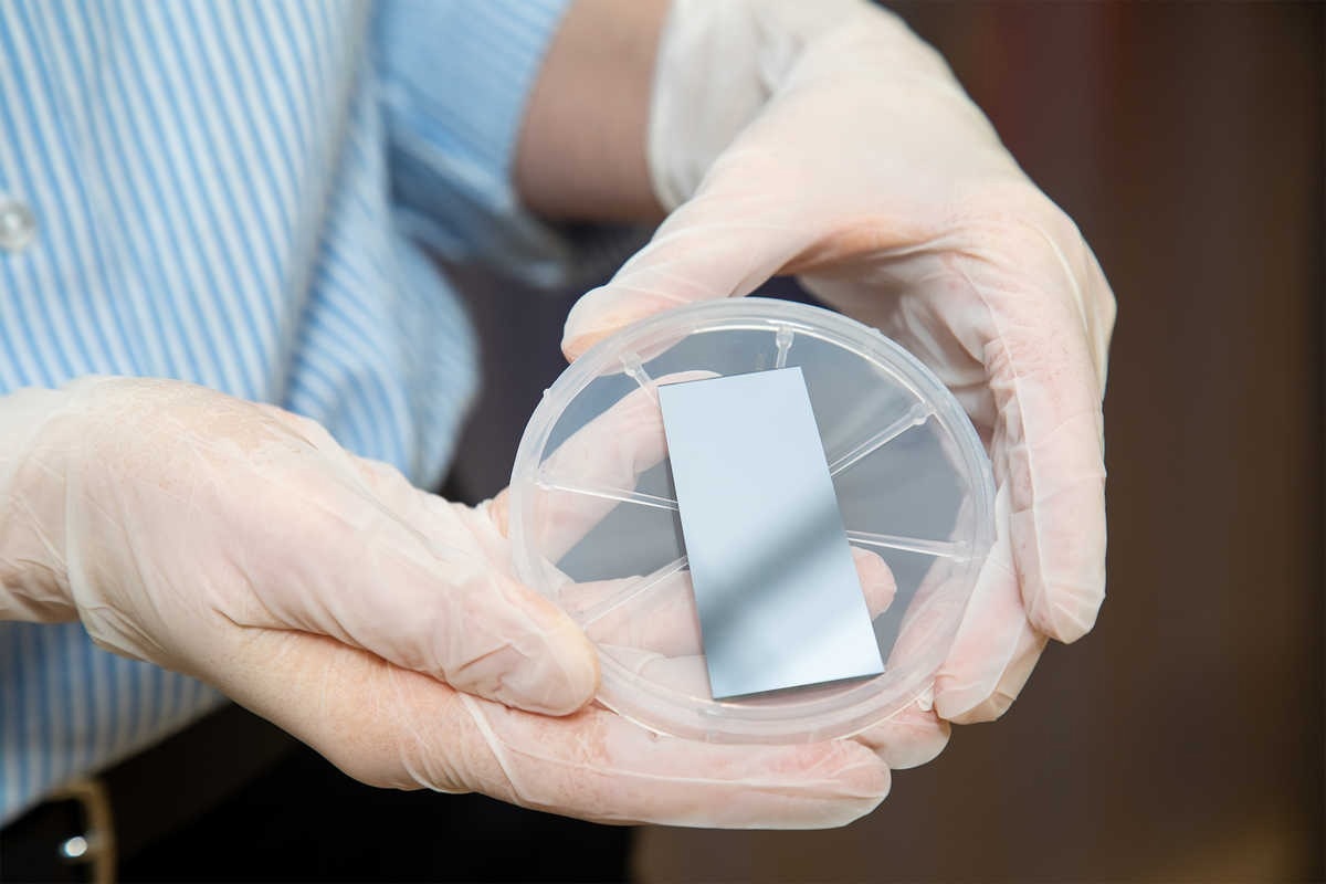SwRI space scientists are collaborating with materials specialists to create more effective particle detection surfaces for spacecraft instruments. Pictured is a conversion surface substrate developed specifically for the IMAP-Lo instrument. Image Credit: SwRI