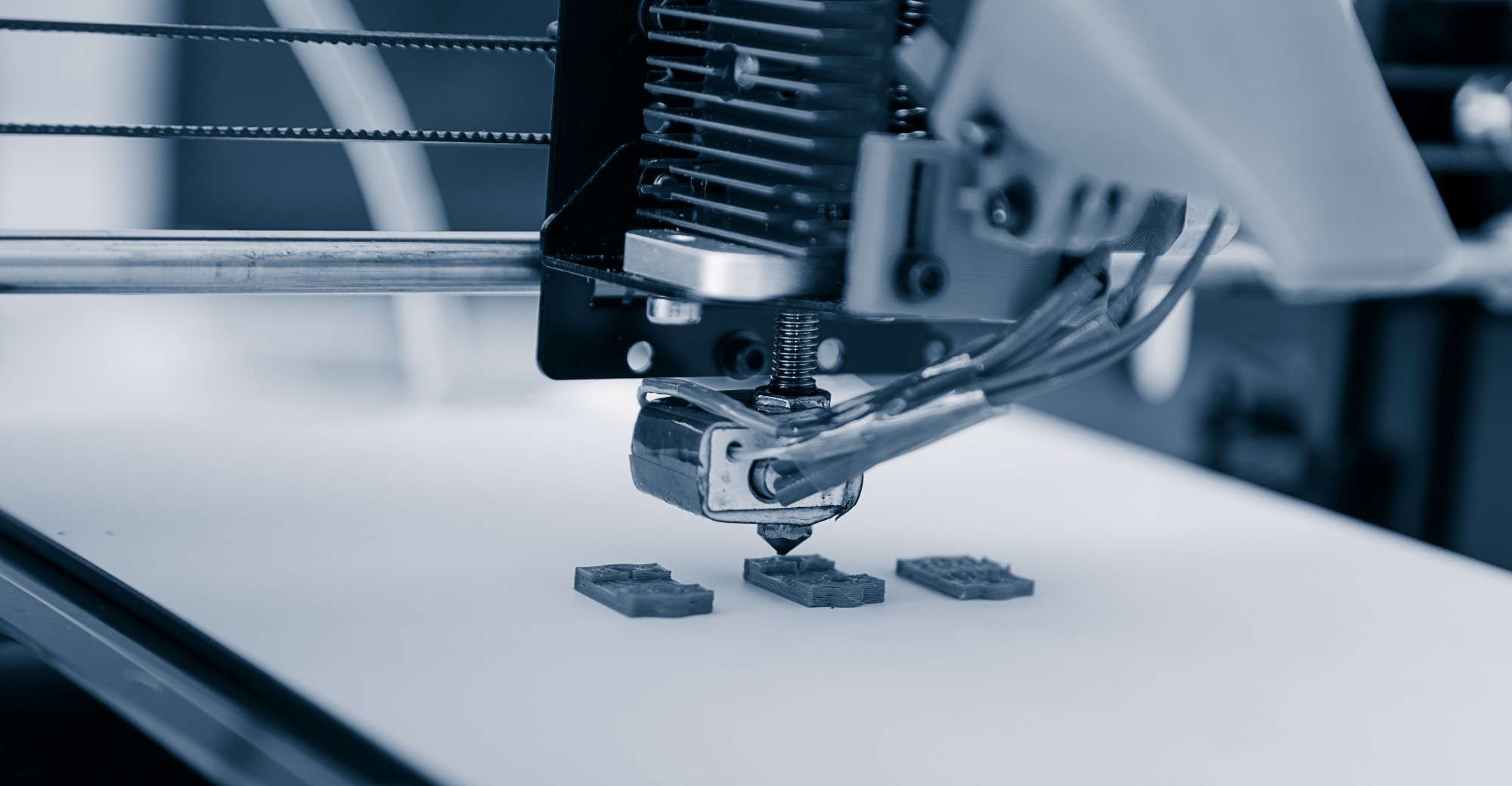 Iterative Printing of Bulk Metal and Polymer for Multi-Layer Electronic Circuits