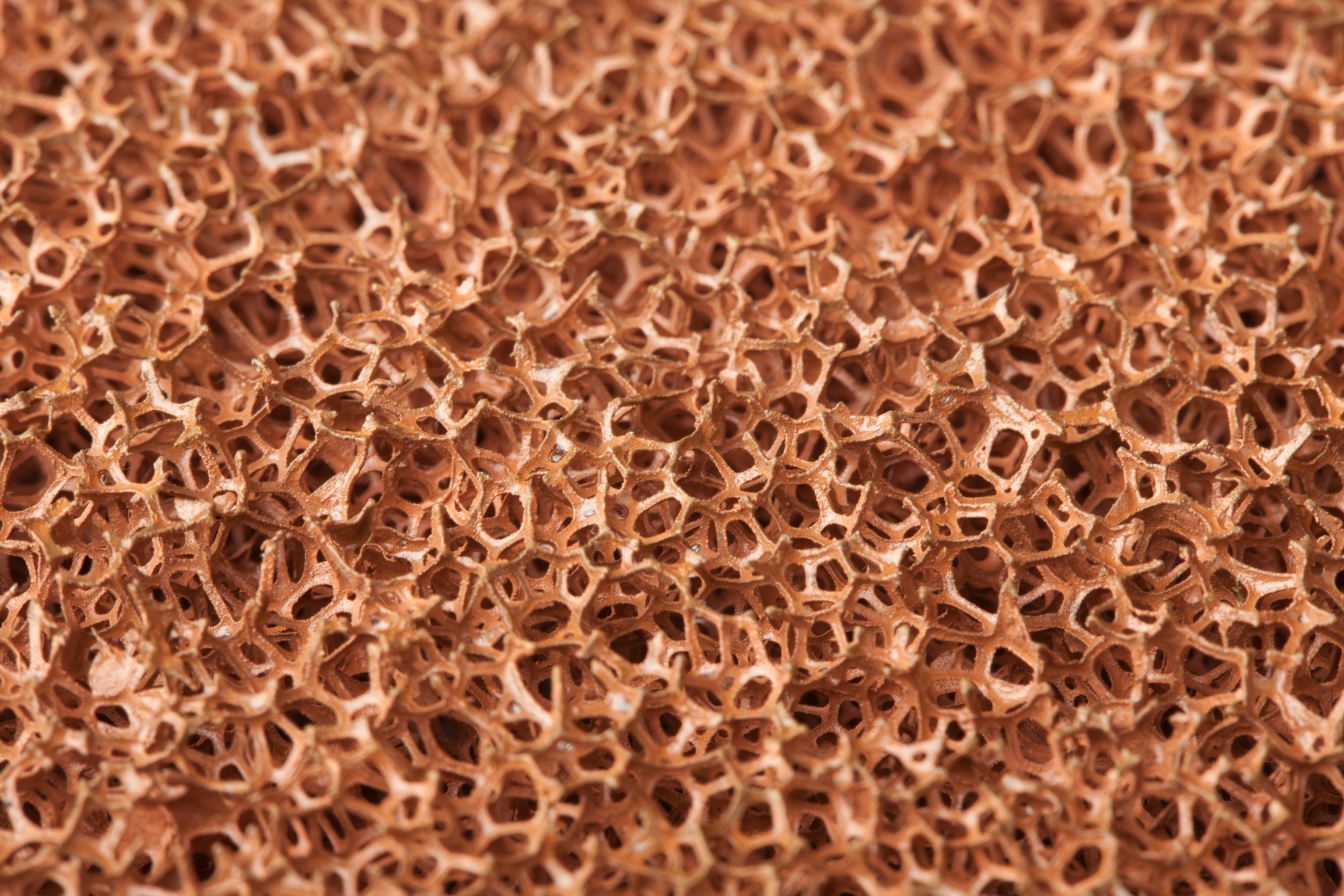 The texture of the synthetic metal foam (Sponge-like metal foam or Metallic Foam).
