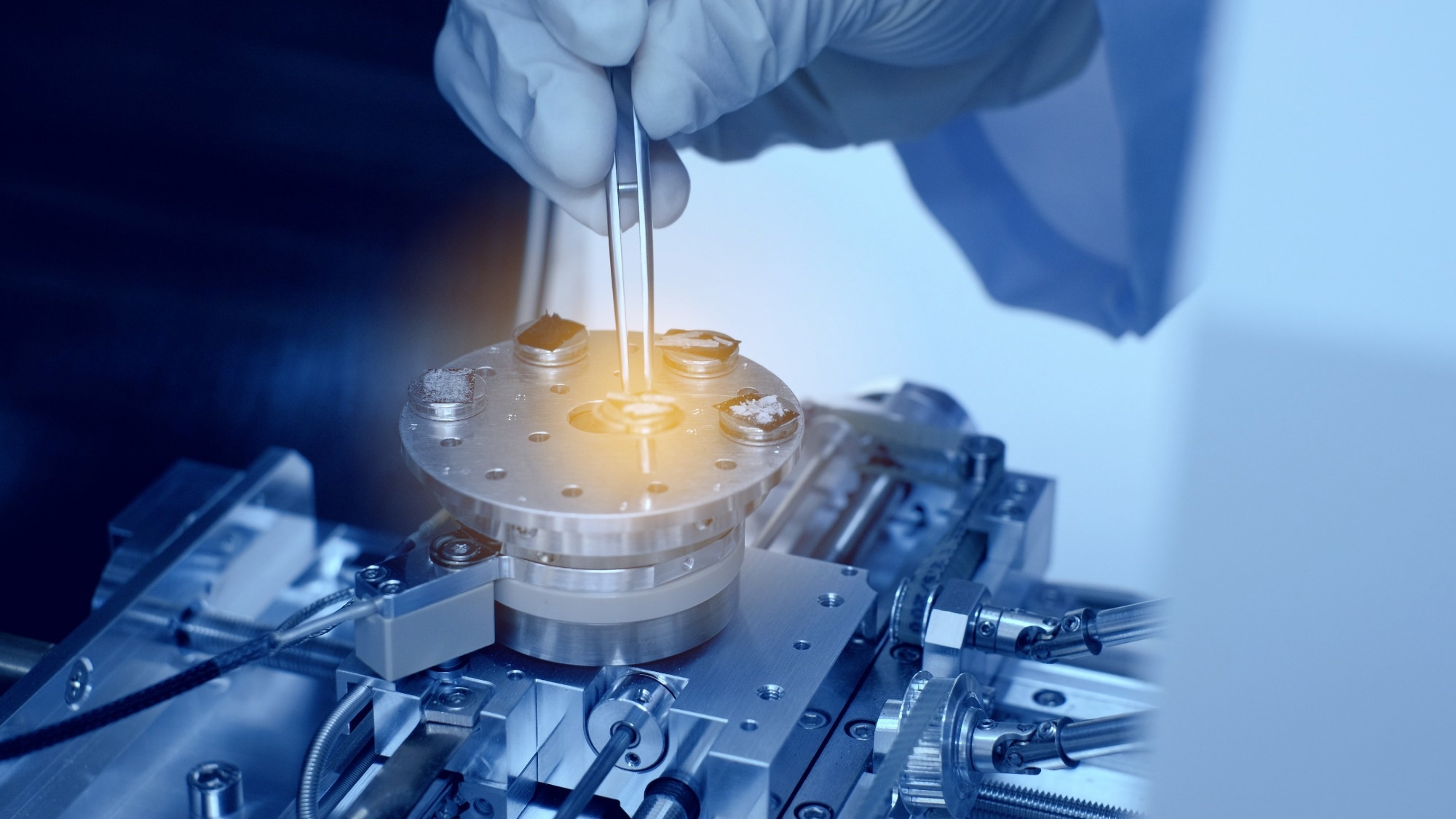 Scientist is preparation of materials for Scanning Electron Microscope (SEM) machine in laboratory