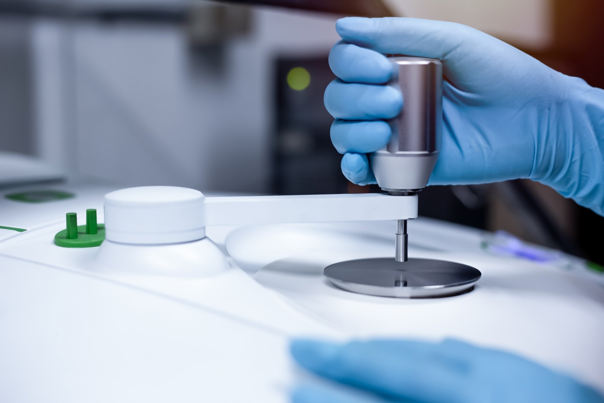 Scientist use the Fourier Transform Infrared spectrometer FTIR
