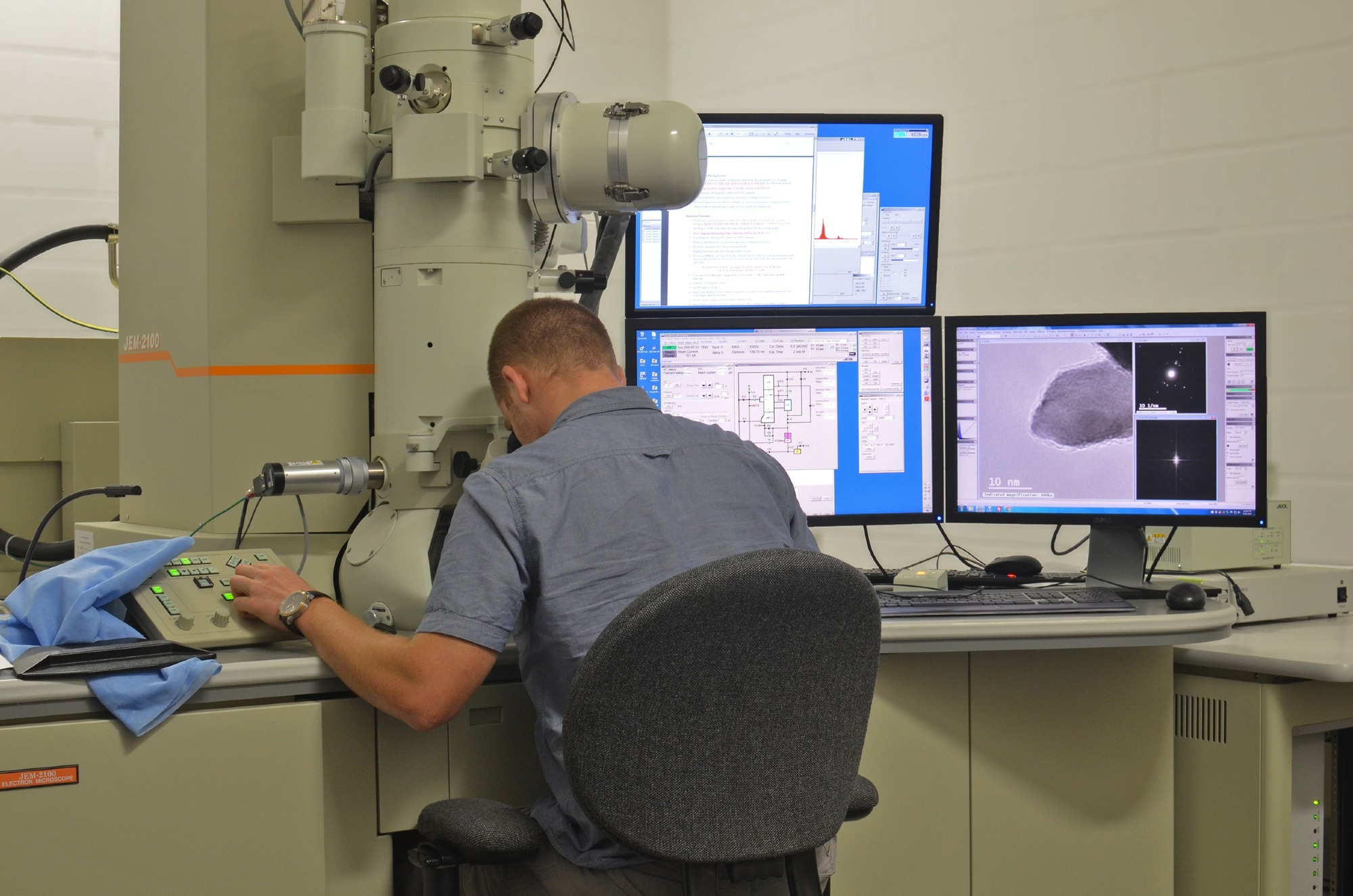 Scientist analyzes nanomaterials in a Transmission Electron Microscope