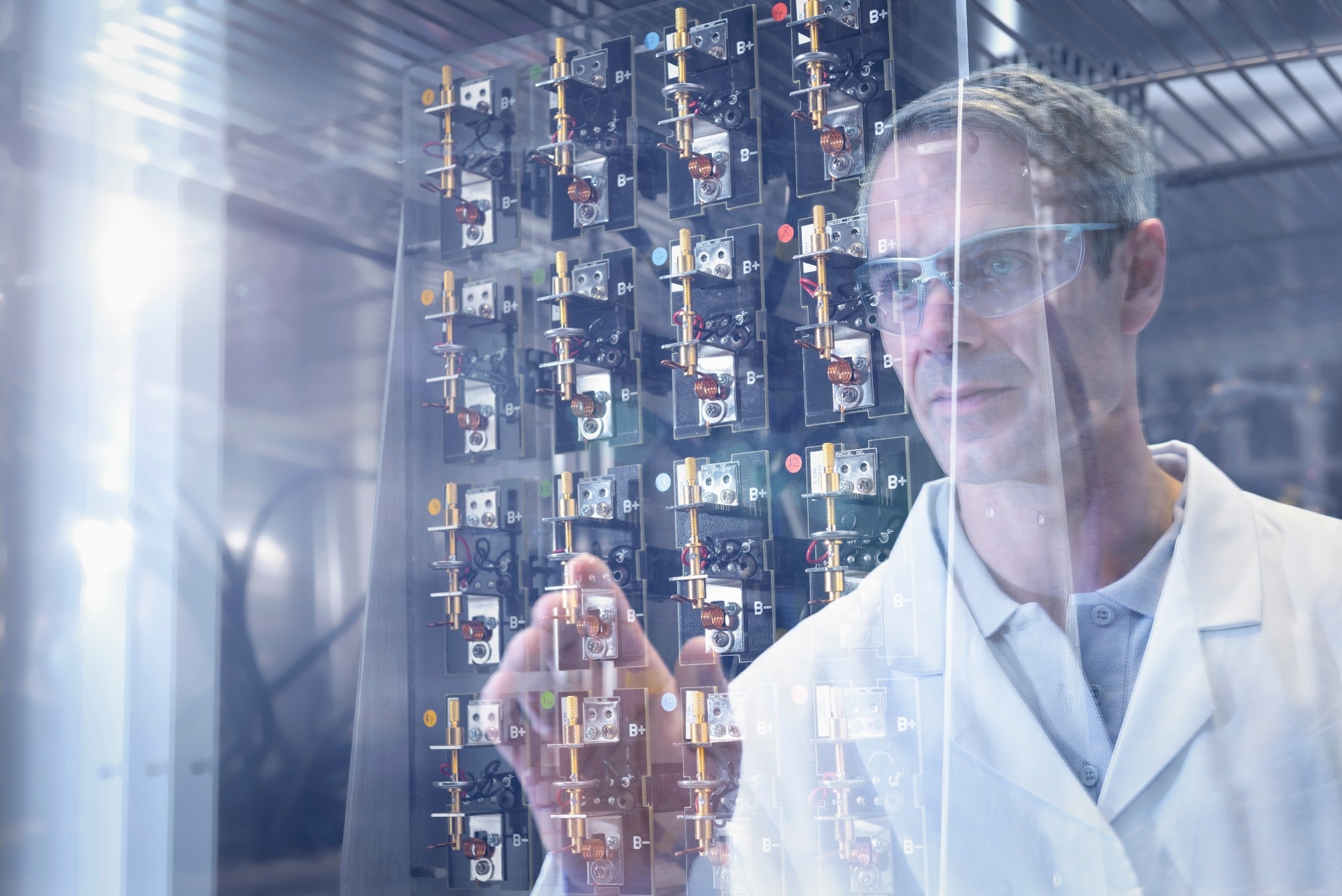 Scientist analyzing lithium ion batteries
