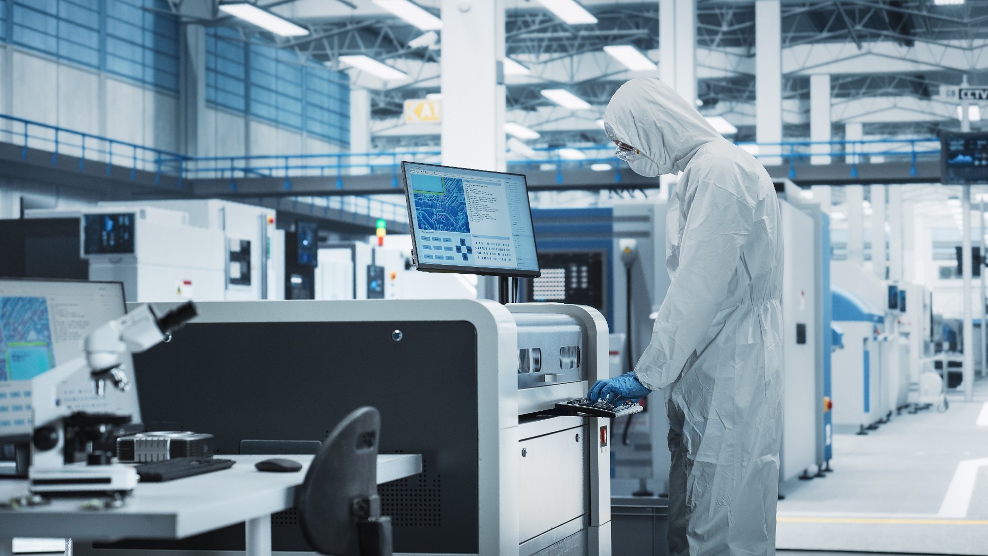 Scientist analysing a sample in an ultra clean lab.