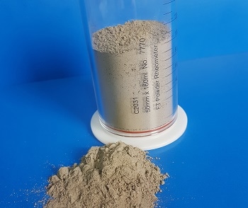 Optimising the Flow Properties of Cement Powders by Surface Treatment