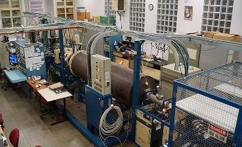 Deploying Transport Barrier for Particle Confinement in Particle Accelerators