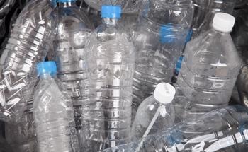 The Impacts of Recycling Waste Plastic Bottles as a Partial Substitute for Fine Natural Aggregates