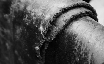 Toughening of Devulcanized Recycled Rubber-Based Composites with Reinforcements