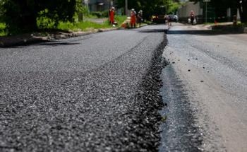 Warm Mix Asphalt Mixed with Iron Filing Waste