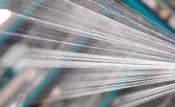 Braided Carbon Nanotube Yarns on an Elastomeric Core for Stretchable Conductive Materials