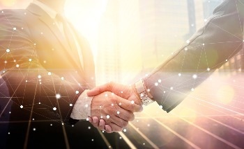 Olympus Agree on Transfer of Evident to Bain Capital