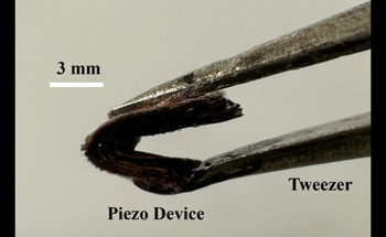 Tiny Generator Powers Electronics with Human Movement
