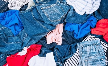 Ultraviolet Ozone Pretreatment Boosts Selective PETase Biodegradation in Textiles