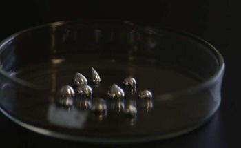 X-Ray Tomography Reveals Crystal Formation Within Liquid Metal