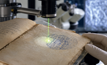 Scientists Use Green Laser Pulses to Clean Ink From Century-Old Paper