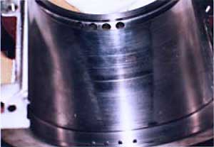 Damage to bearing surface due to motor misalignment