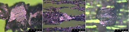 Photographs of ferrograms showing severe sliding wear during break-in