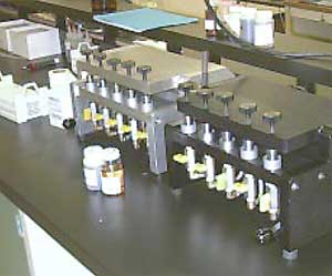 Multi-station RFS sample preparation fixture