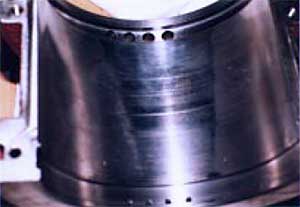 Damage to bearing surface due to motor misalignment
