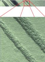 TappingMode+ height image and zoom of a copolymer. The square image is a zoom into the boxed area in the original rectangular image. This detail is revealed by simply zooming in with software and without the need for time-consuming, repetitive smaller scans. Without this higher resolution scanning, the zoomed image would not have the pixel resolution required to view nanoscale details