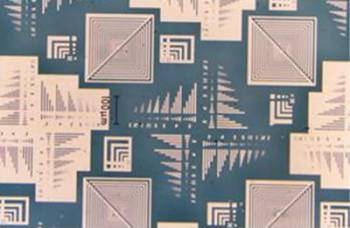Etched pattern of gold film on the glass substrate.